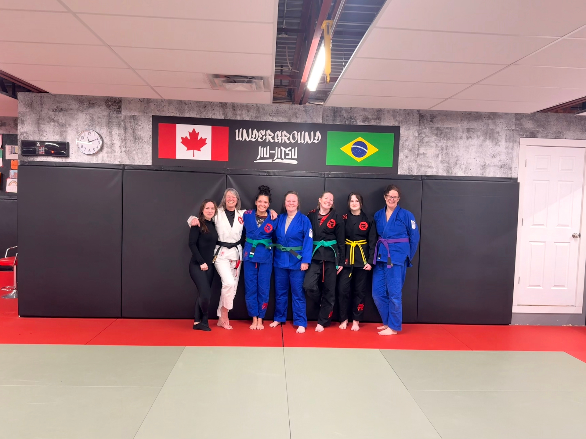 Women training Brazilian Jiu-Jitsu in the Gi at Underground martial arts academy